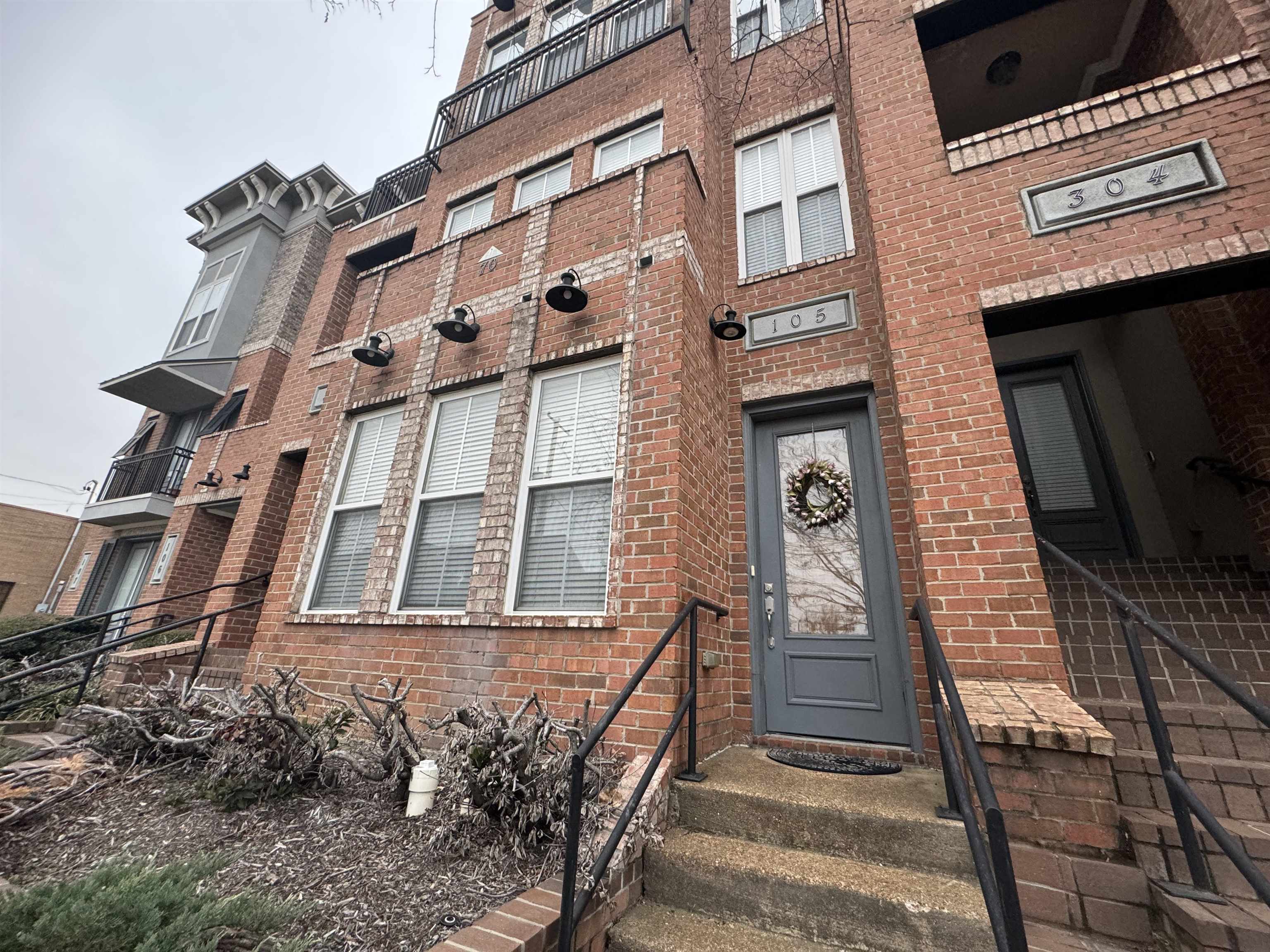 70 West Carolina Avenue, Unit 105 Memphis, TN 38103 - Photo 3 of 40 front view of a house with a door