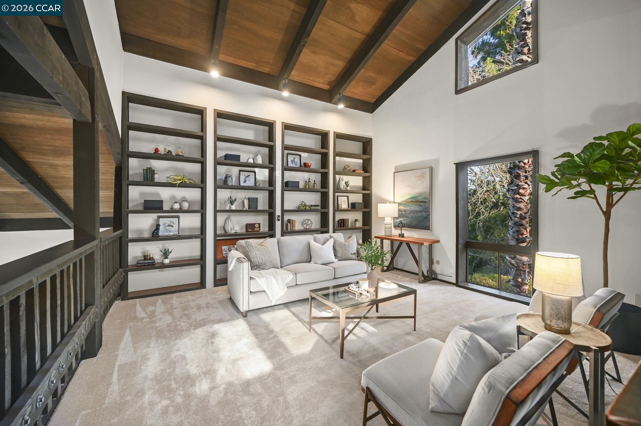 3912 Quail Ridge Road Lafayette, CA 94549 - Photo 16 of 60 a living room with furniture and a large window