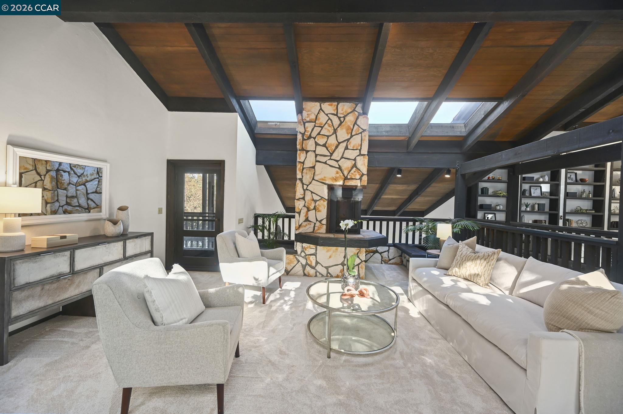 3912 Quail Ridge Road Lafayette, CA 94549 - Photo 17 of 60 a living room with furniture and a table