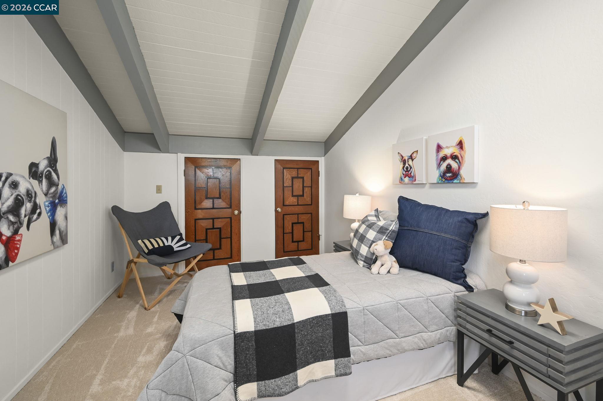 3912 Quail Ridge Road Lafayette, CA 94549 - Photo 33 of 60 a bedroom with a bed and wooden floor