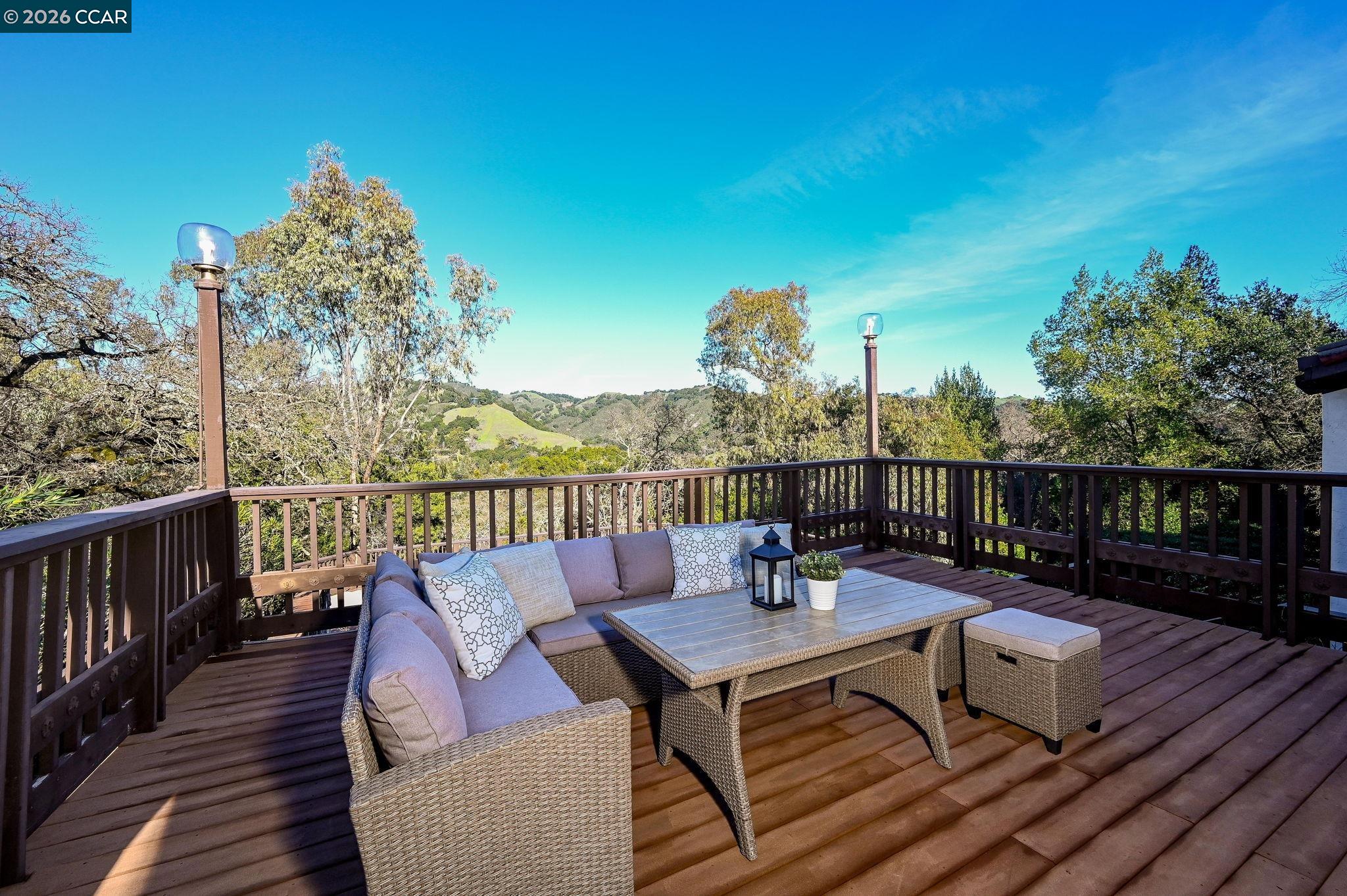 3912 Quail Ridge Road Lafayette, CA 94549 - Photo 44 of 60 a view of a balcony with wooden floor and outdoor seating