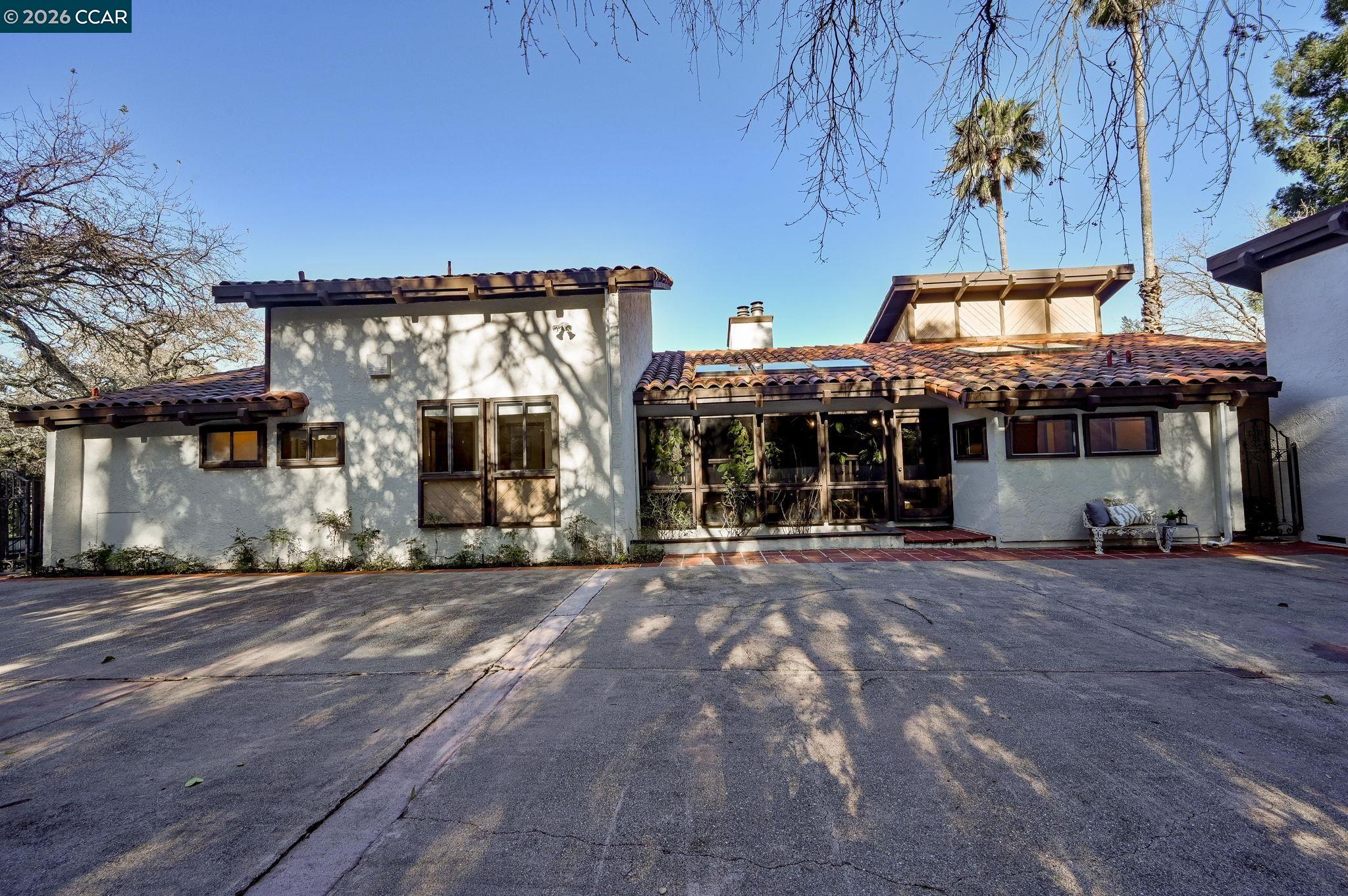 3912 Quail Ridge Road Lafayette, CA 94549 - Photo 47 of 60 a view of a house with a patio