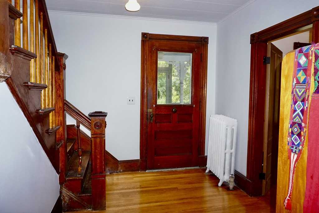 4 Carpenter Road Monson, MA 01057 - Photo 7 of 29 a view of an entryway with wooden floor and door
