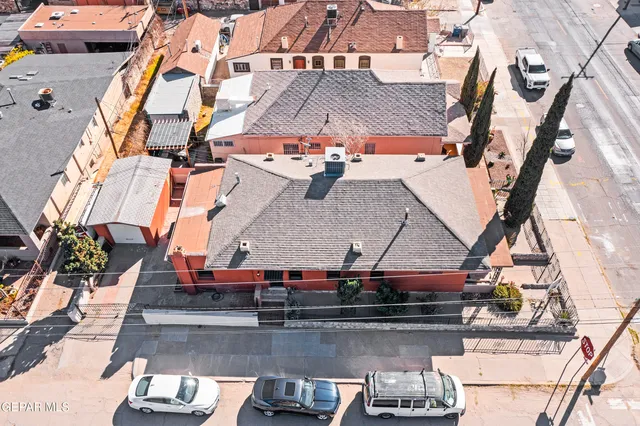 an aerial view of a house with sitting area