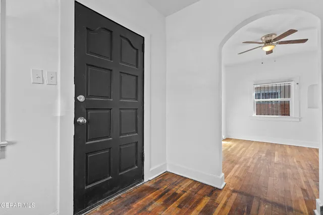 a view of a livingroom with wooden floor