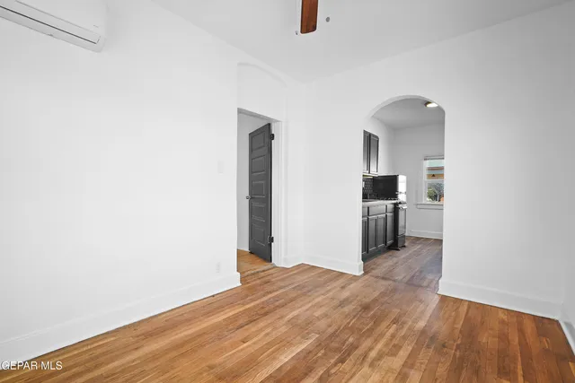 a view of a kitchen from the hallway