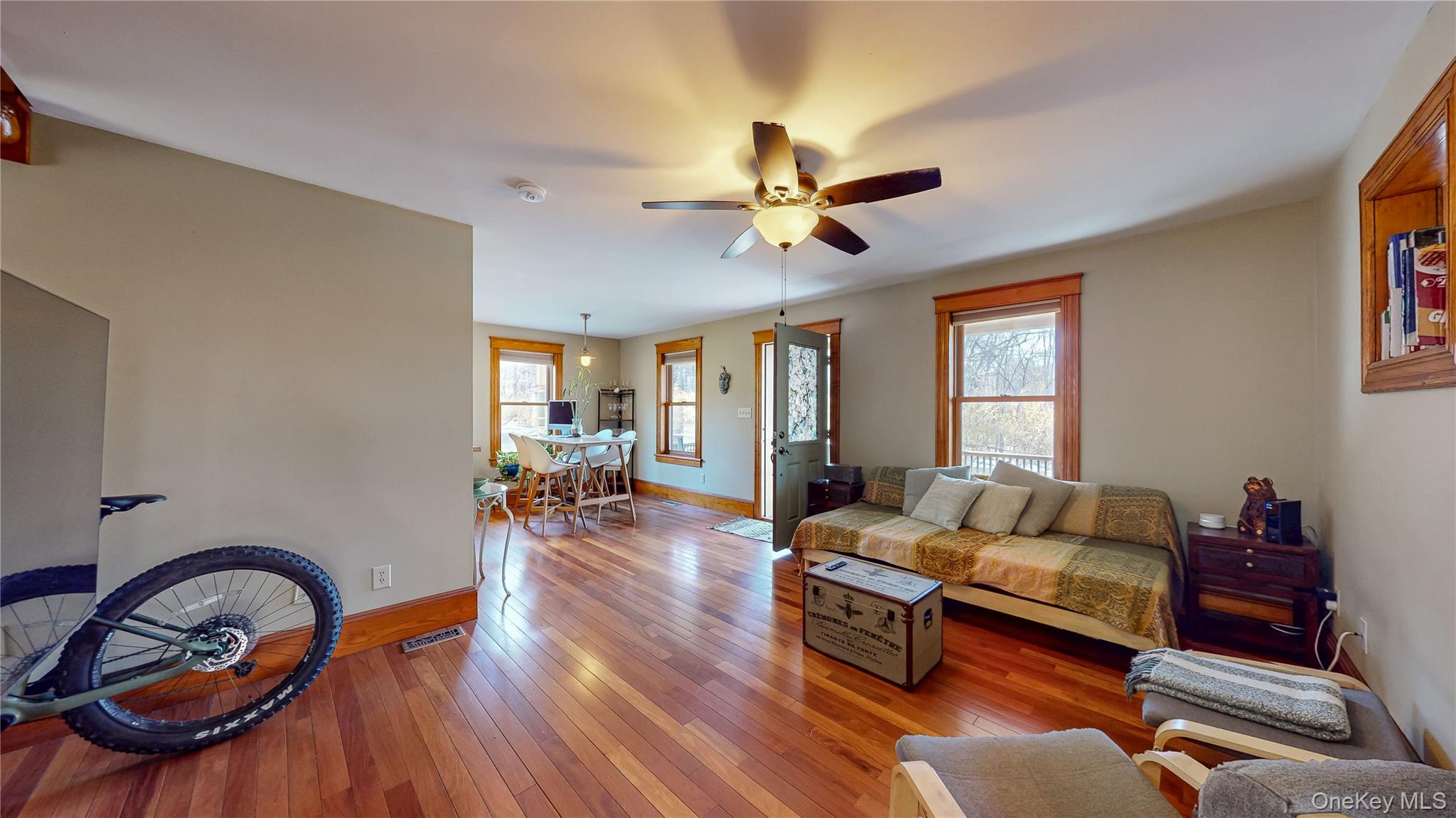 1193 S Road Wurtsboro, NY 12790 - Photo 21 of 41 a living room with furniture a window and wooden floor