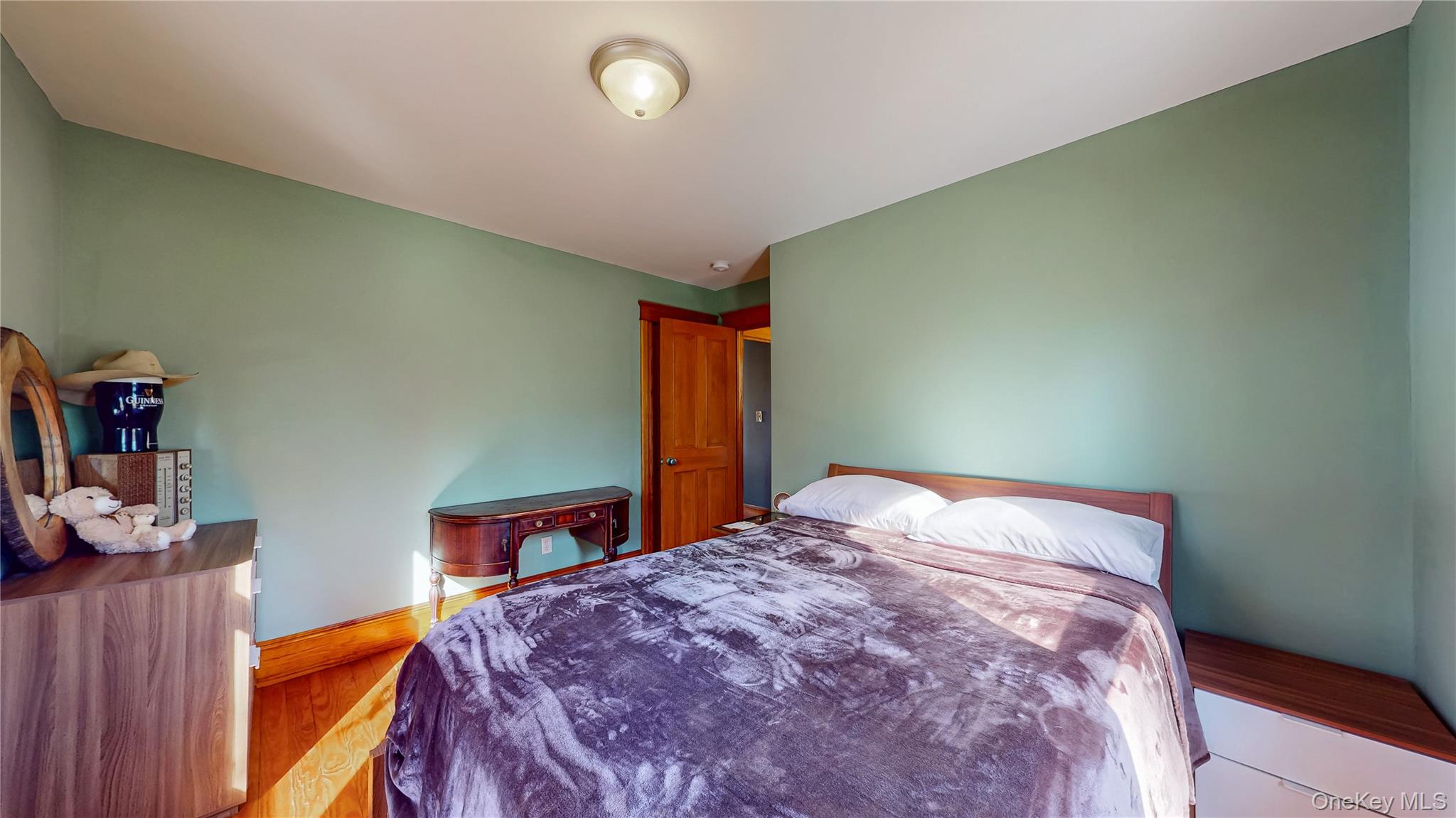 1193 S Road Wurtsboro, NY 12790 - Photo 31 of 41 a bed in a room next to a window