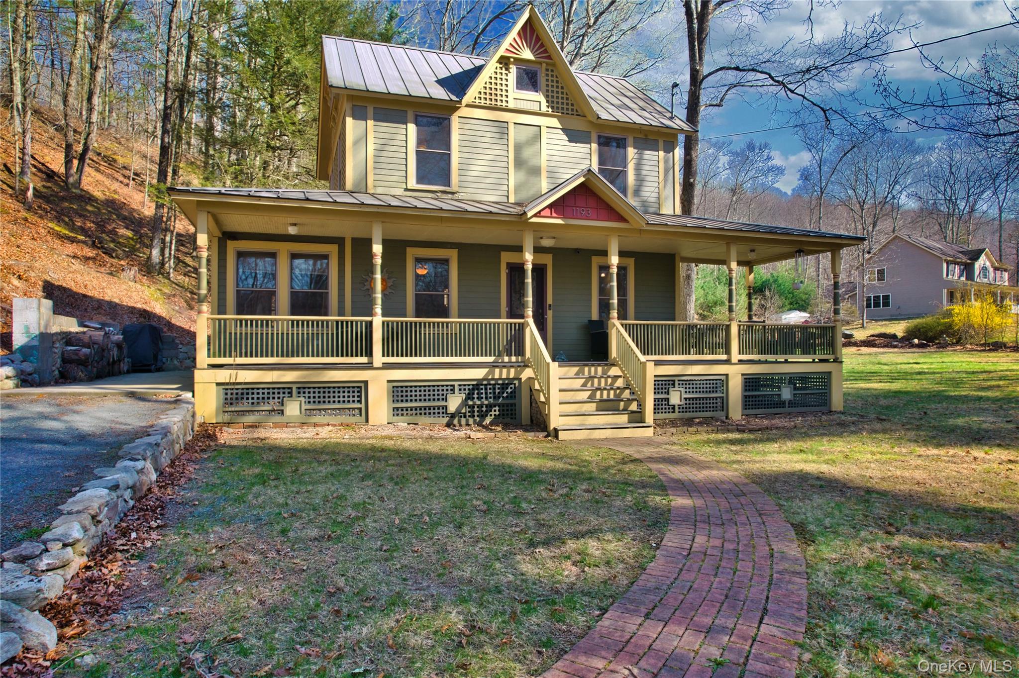 1193 S Road Wurtsboro, NY 12790 - Photo 40 of 41 a view of a house with a yard and sitting area