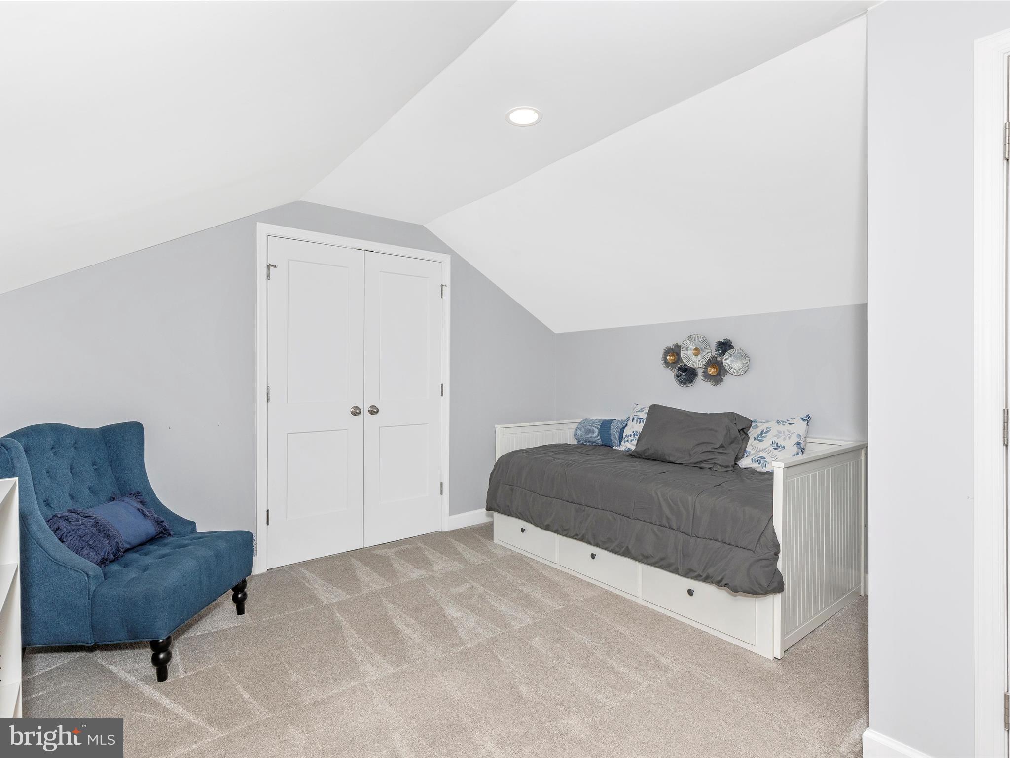 207 Thomas Avenue Frederick, MD 21701 - Photo 30 of 60 a living room with furniture and a couch