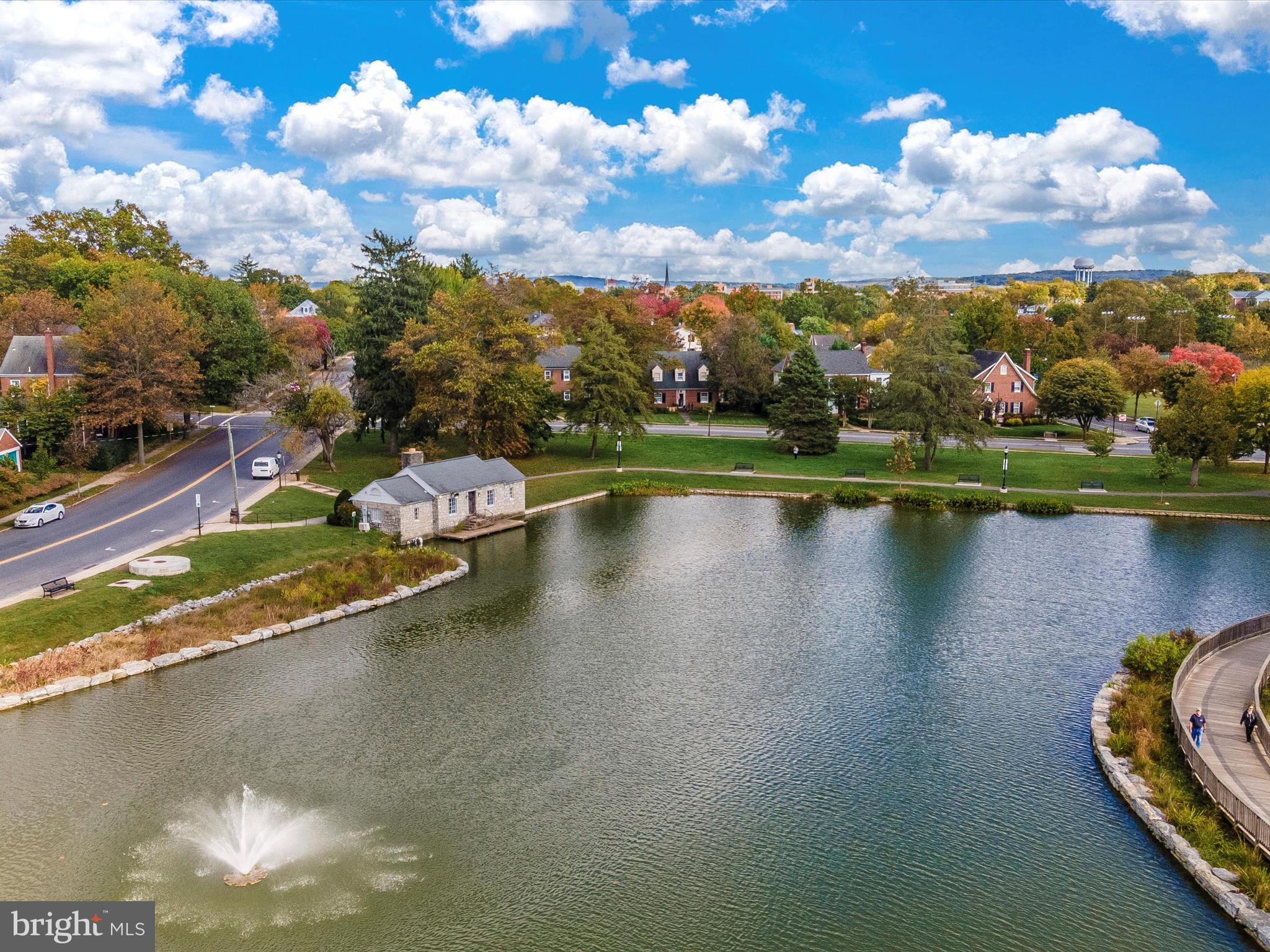 207 Thomas Avenue Frederick, MD 21701 - Photo 59 of 60 a view of a lake in front of house with outdoor seating