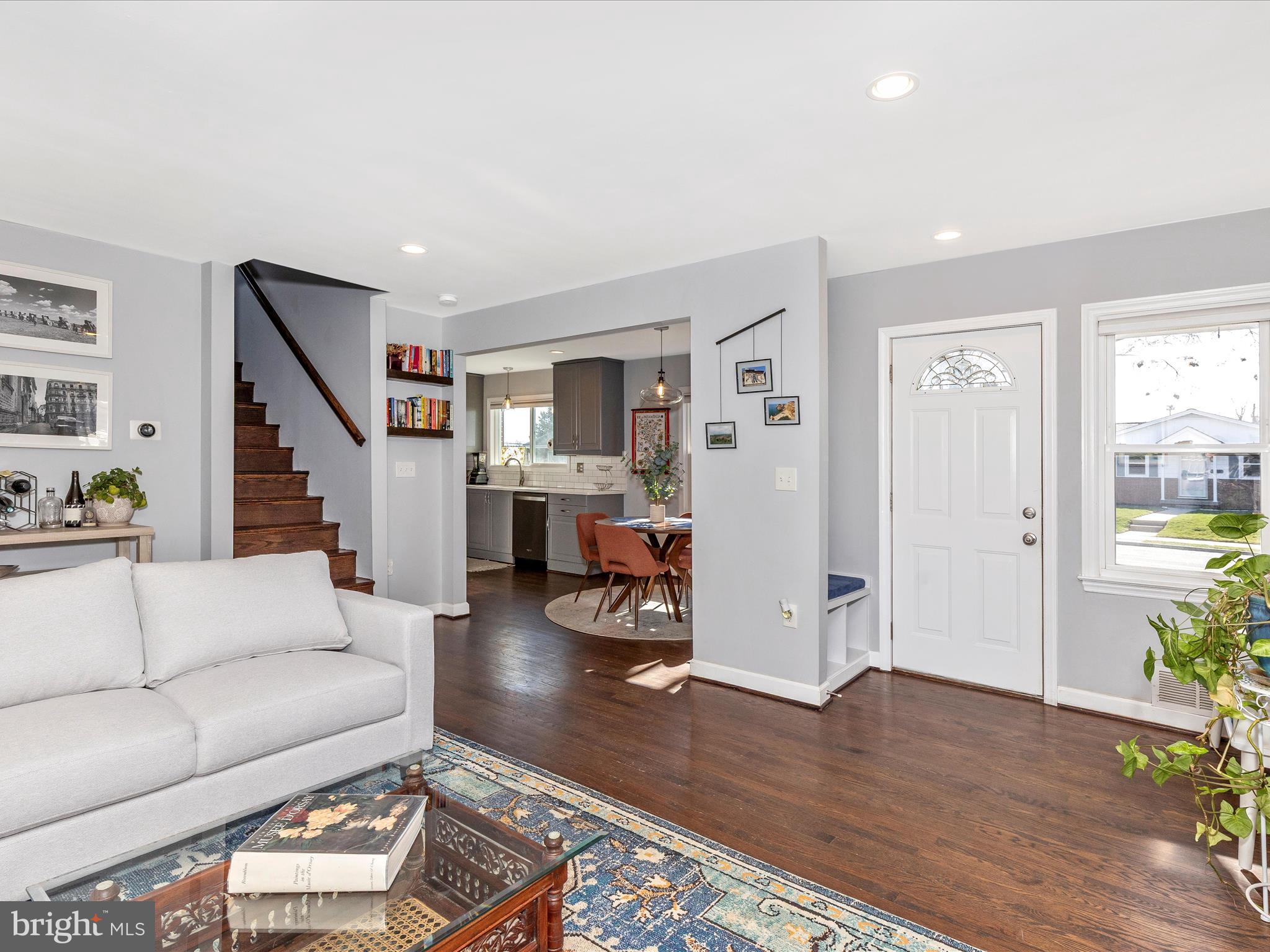 207 Thomas Avenue Frederick, MD 21701 - Photo 8 of 60 a living room with furniture and a wooden floor