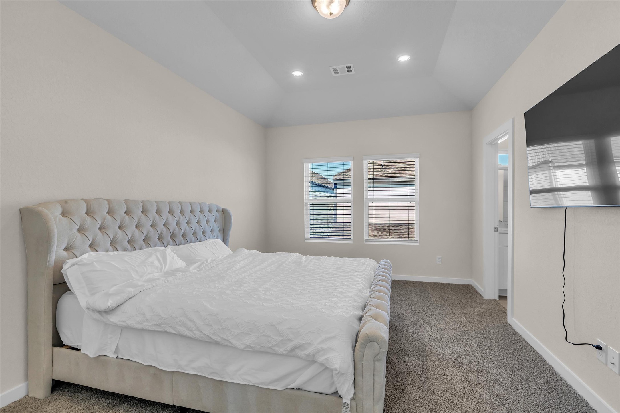 3109 Boulder Rnch Drive Houston, TX 77063 - Photo 14 of 15 a bedroom with a bed and a window