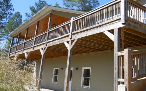 153 Henry Evans Road Ellijay, GA 30536 - Photo 1 of 1 a balcony view with wooden floor
