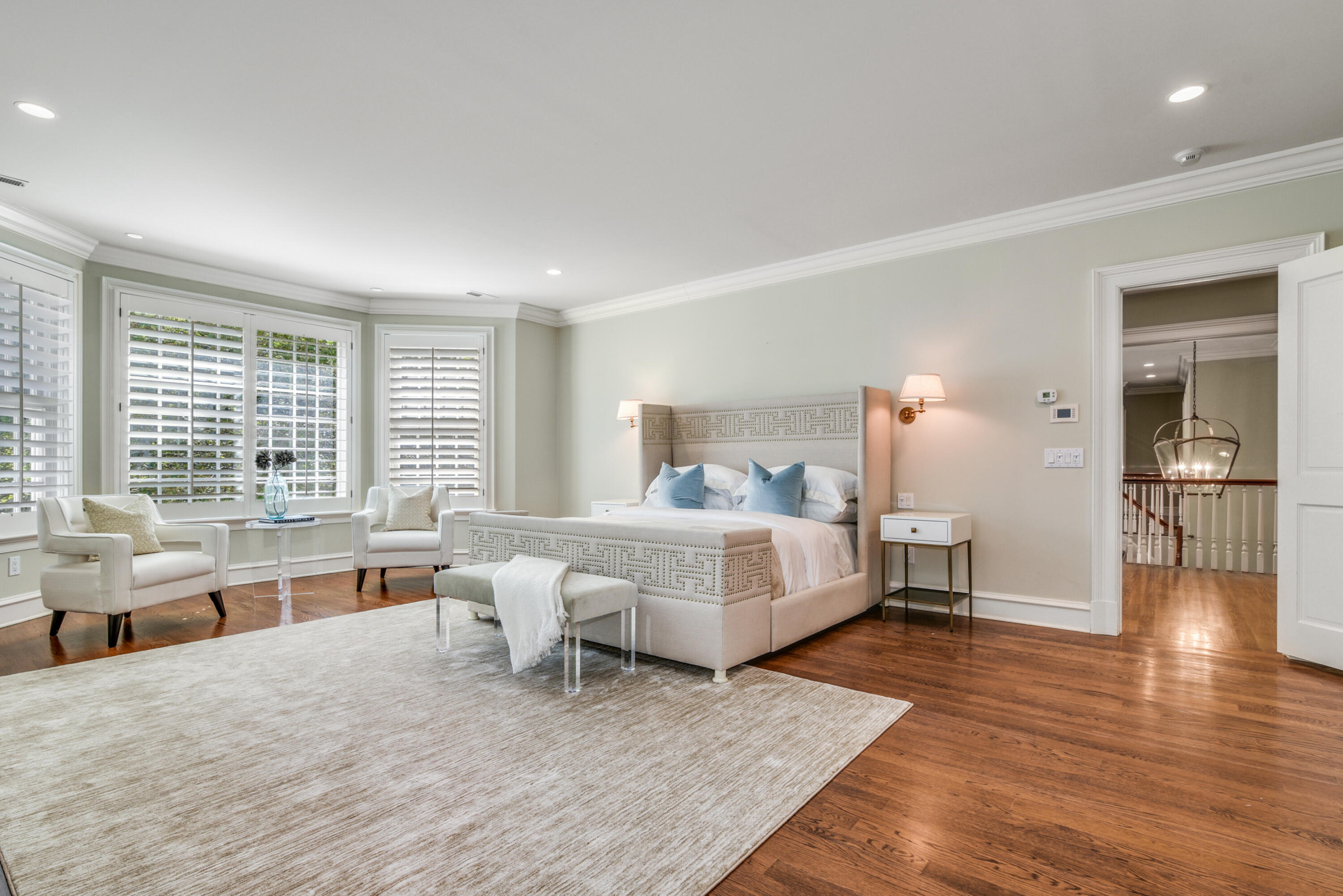 183 Ferris Hill Road New Canaan, CT 06840 - Photo 22 of 40 a bed room with a bed and windows