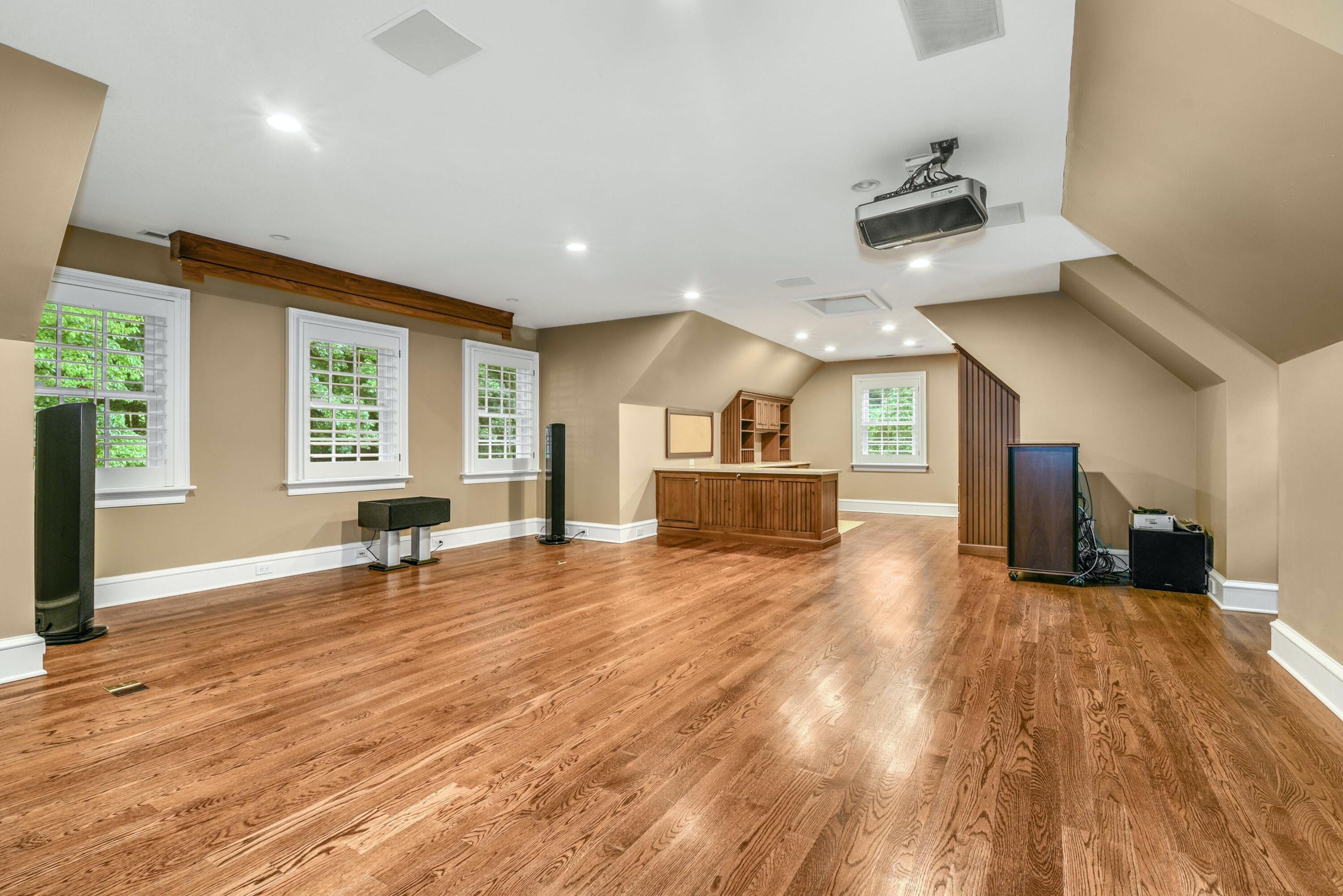183 Ferris Hill Road New Canaan, CT 06840 - Photo 28 of 40 a view of a livingroom with furniture a ceiling fan and window