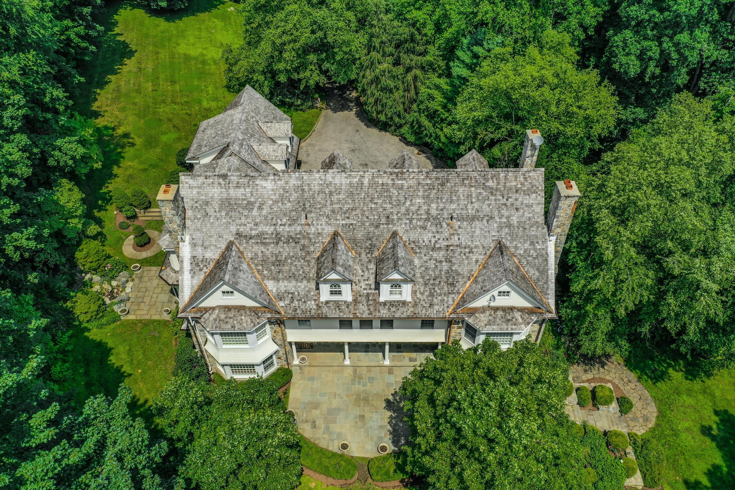 183 Ferris Hill Road New Canaan, CT 06840 - Photo 6 of 40 an aerial view of a house with a yard