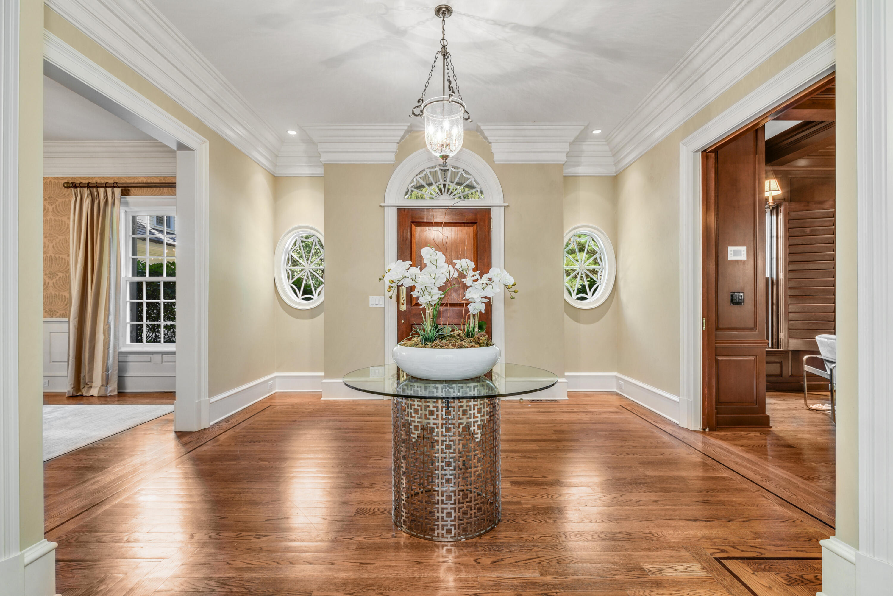 183 Ferris Hill Road New Canaan, CT 06840 - Photo 7 of 40 a dining room with wooden floor table and chairs
