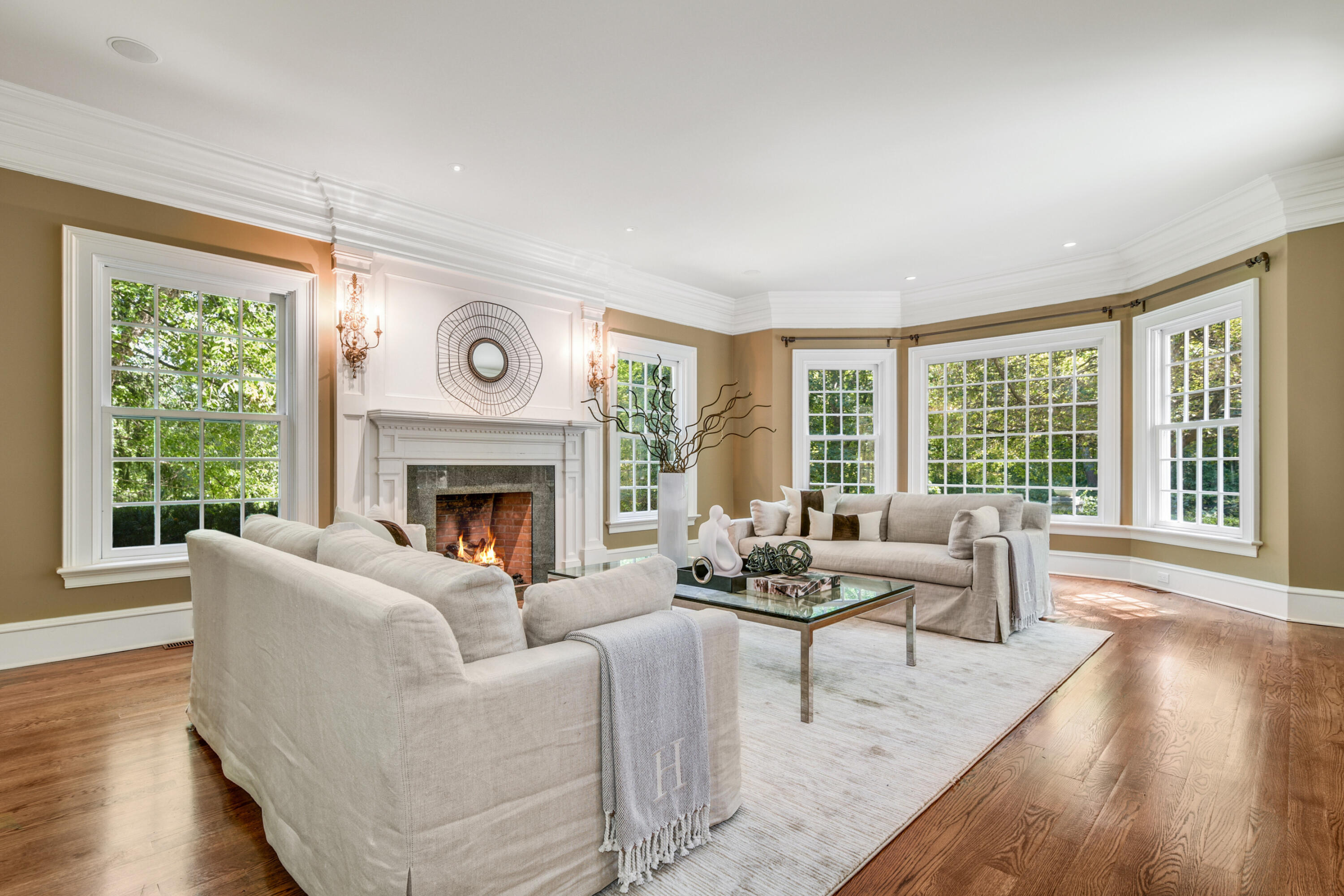 183 Ferris Hill Road New Canaan, CT 06840 - Photo 10 of 40 a living room with furniture and a fireplace