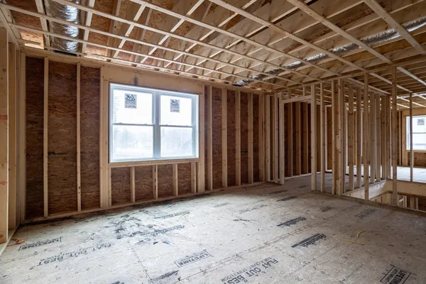 an empty room with windows