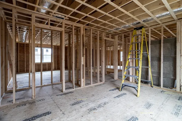 a view of a room with wooden walls
