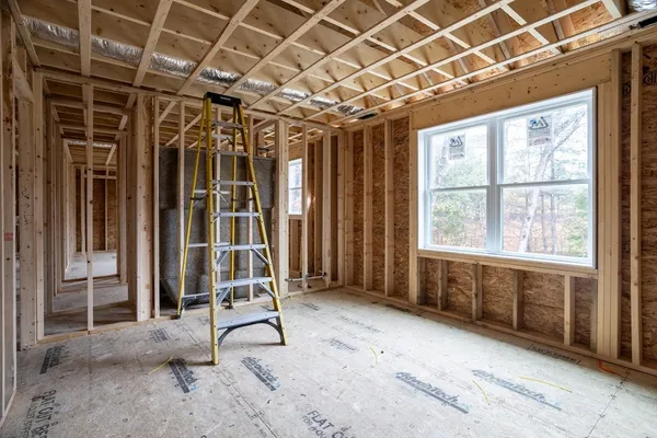 a view of a room with wooden walls