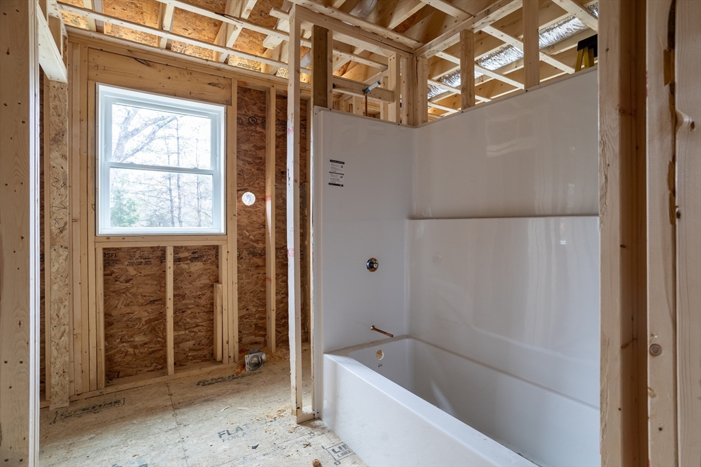 48 Jewell Road, Unit LOT 6 Marlborough, MA 01752 - Photo 20 of 35 a bathroom with a bathtub and a shower