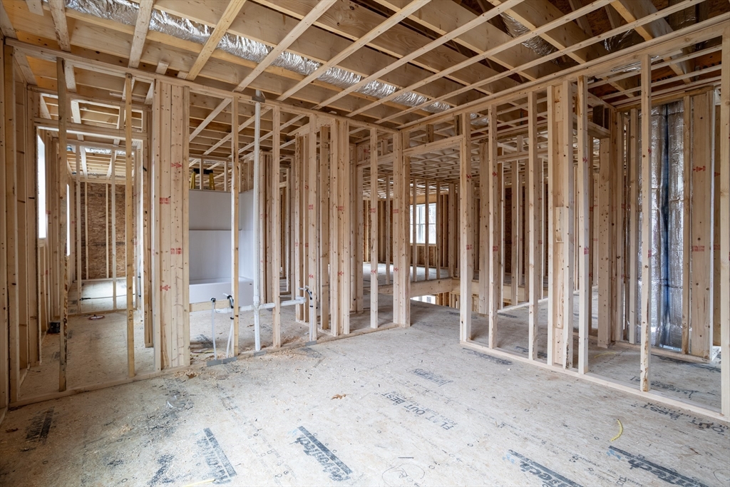 48 Jewell Road, Unit LOT 6 Marlborough, MA 01752 - Photo 27 of 35 a view of a room with wooden walls