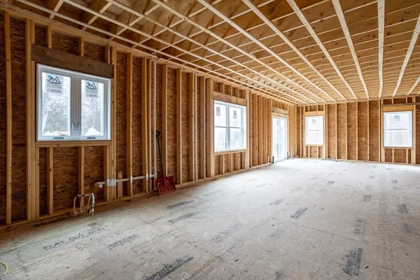 an empty room with windows