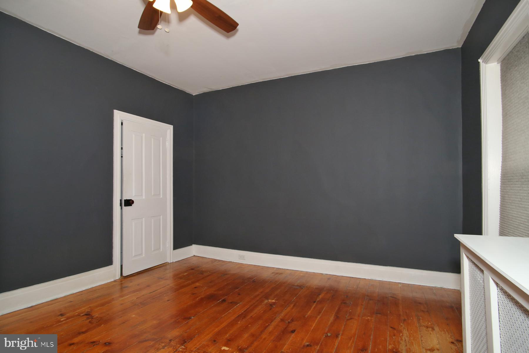 133 West Market Street Jonestown, PA 17038 - Photo 21 of 43 a view of empty room with wooden floor and fan