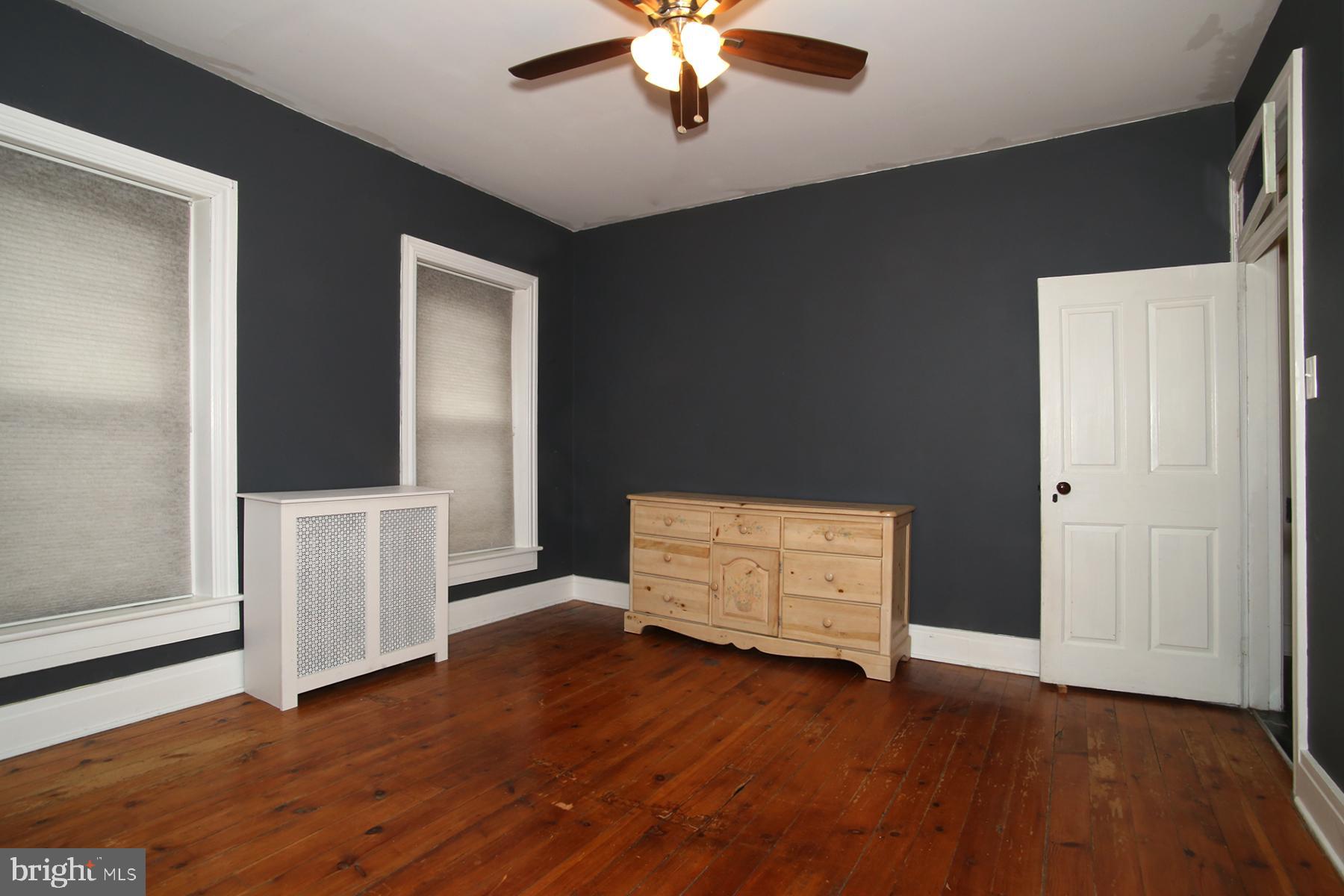 133 West Market Street Jonestown, PA 17038 - Photo 23 of 43 wooden floor in an empty room with a window
