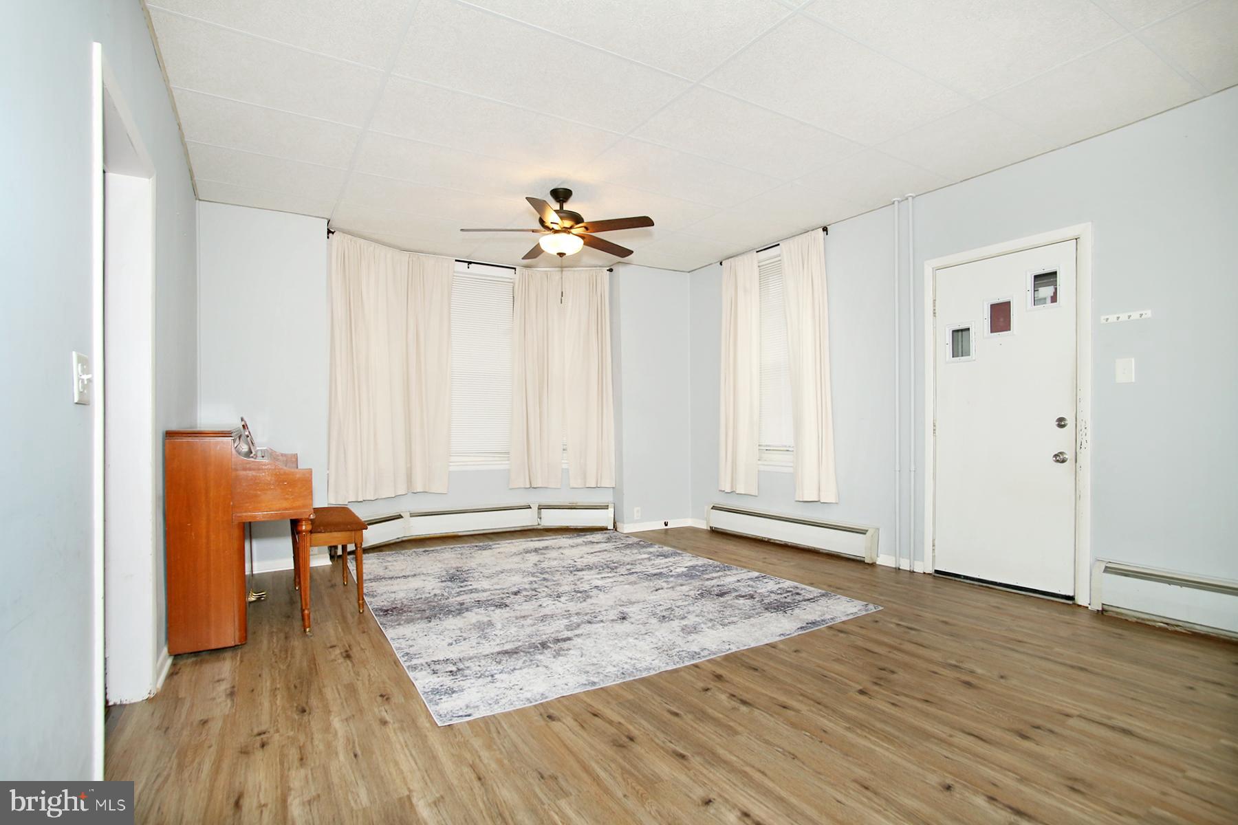 133 West Market Street Jonestown, PA 17038 - Photo 3 of 43 a view of livingroom with hardwood floor and a ceiling fan
