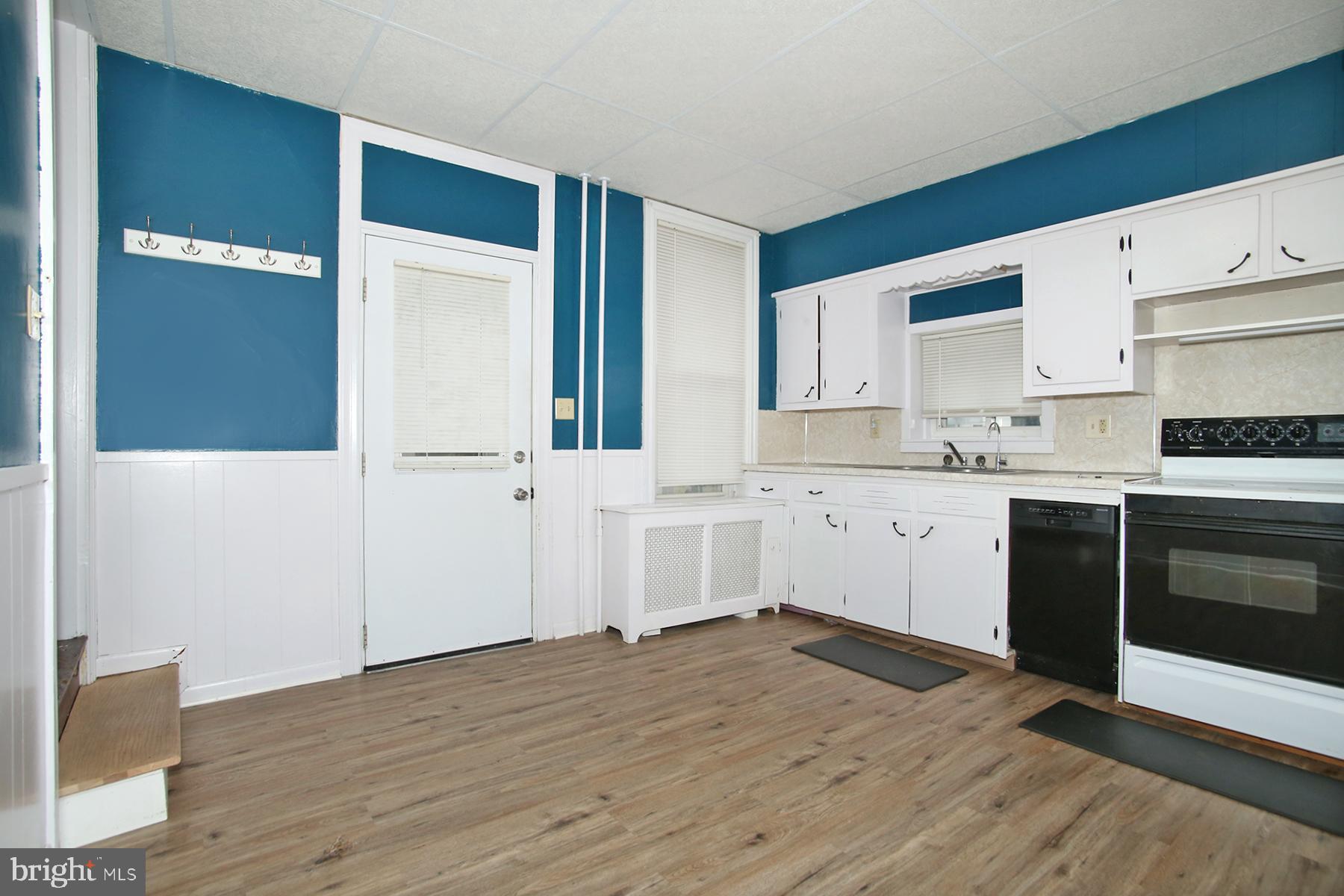 133 West Market Street Jonestown, PA 17038 - Photo 10 of 43 a kitchen with a sink cabinets and wooden floor