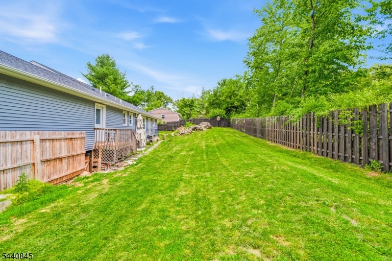 36 Forest Road Andover, NJ 07821 - Photo 21 of 50 a view of a backyard with a small cabin