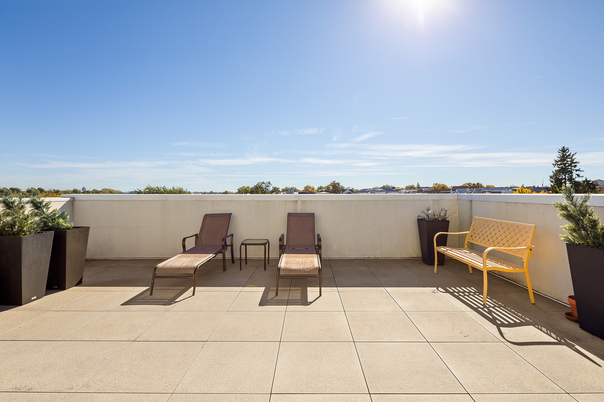 20-48 Steinway Street, Unit 1B Queens, NY 11105 - Photo 9 of 10 a living room with furniture and a ocean view