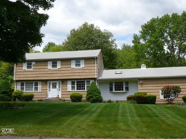 37 Marathon Road Trumbull, CT 06611 - Photo 1 of 1 a front view of a house with a garden