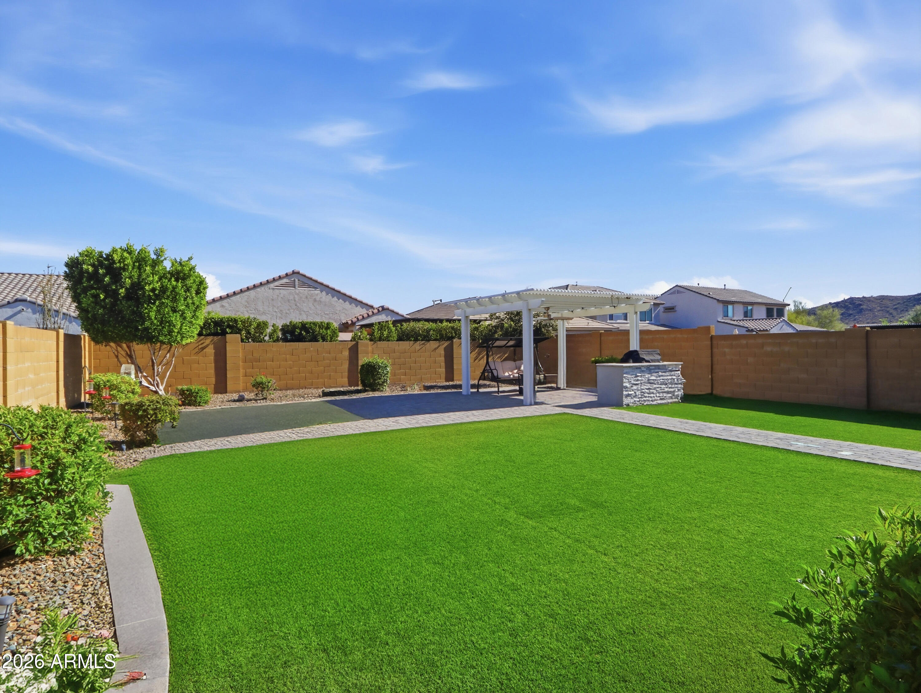 6421 Roy Rogers Road Phoenix, AZ 85083 - Photo 10 of 17 a front view of house with yard and outdoor seating