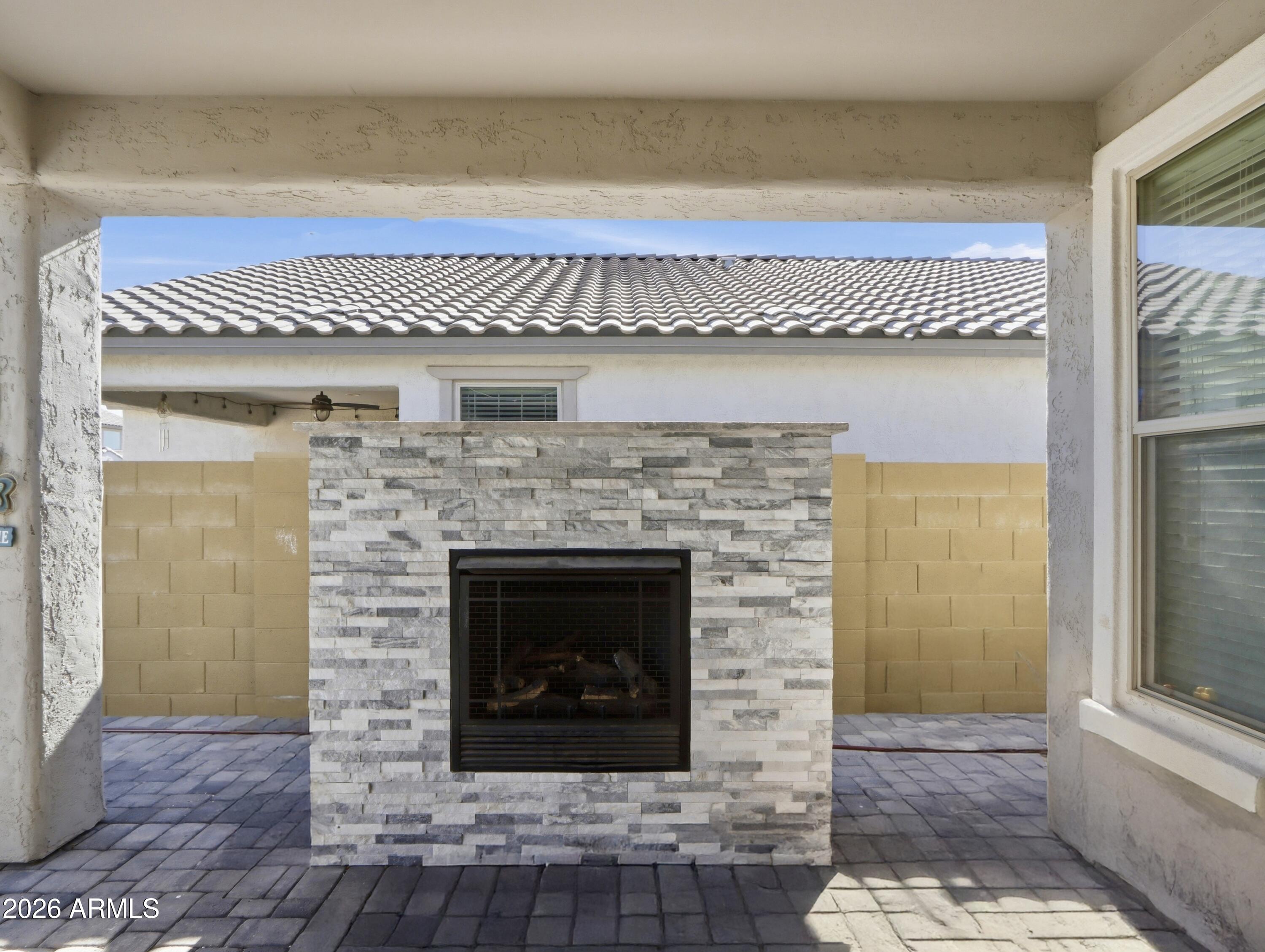 6421 Roy Rogers Road Phoenix, AZ 85083 - Photo 12 of 17 a living room with a fireplace