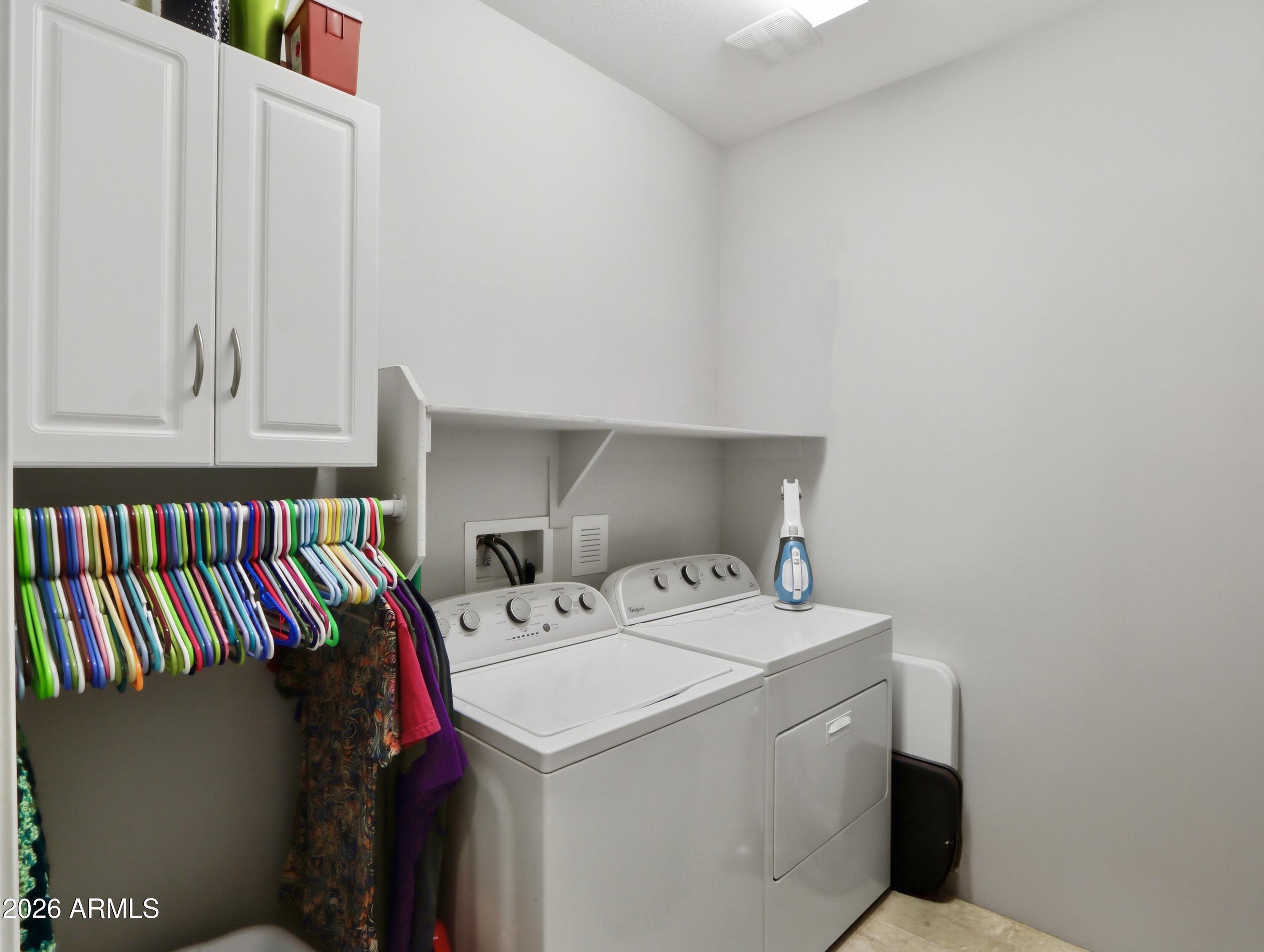 6421 Roy Rogers Road Phoenix, AZ 85083 - Photo 15 of 17 a utility room with dryer and washer