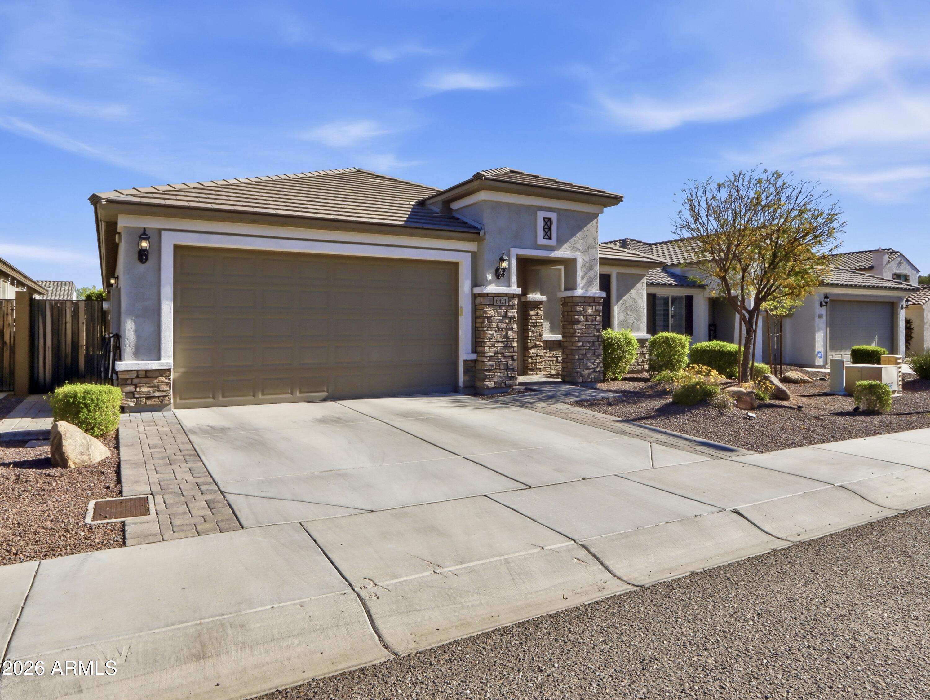 6421 Roy Rogers Road Phoenix, AZ 85083 - Photo 16 of 17 a front view of a house with yard
