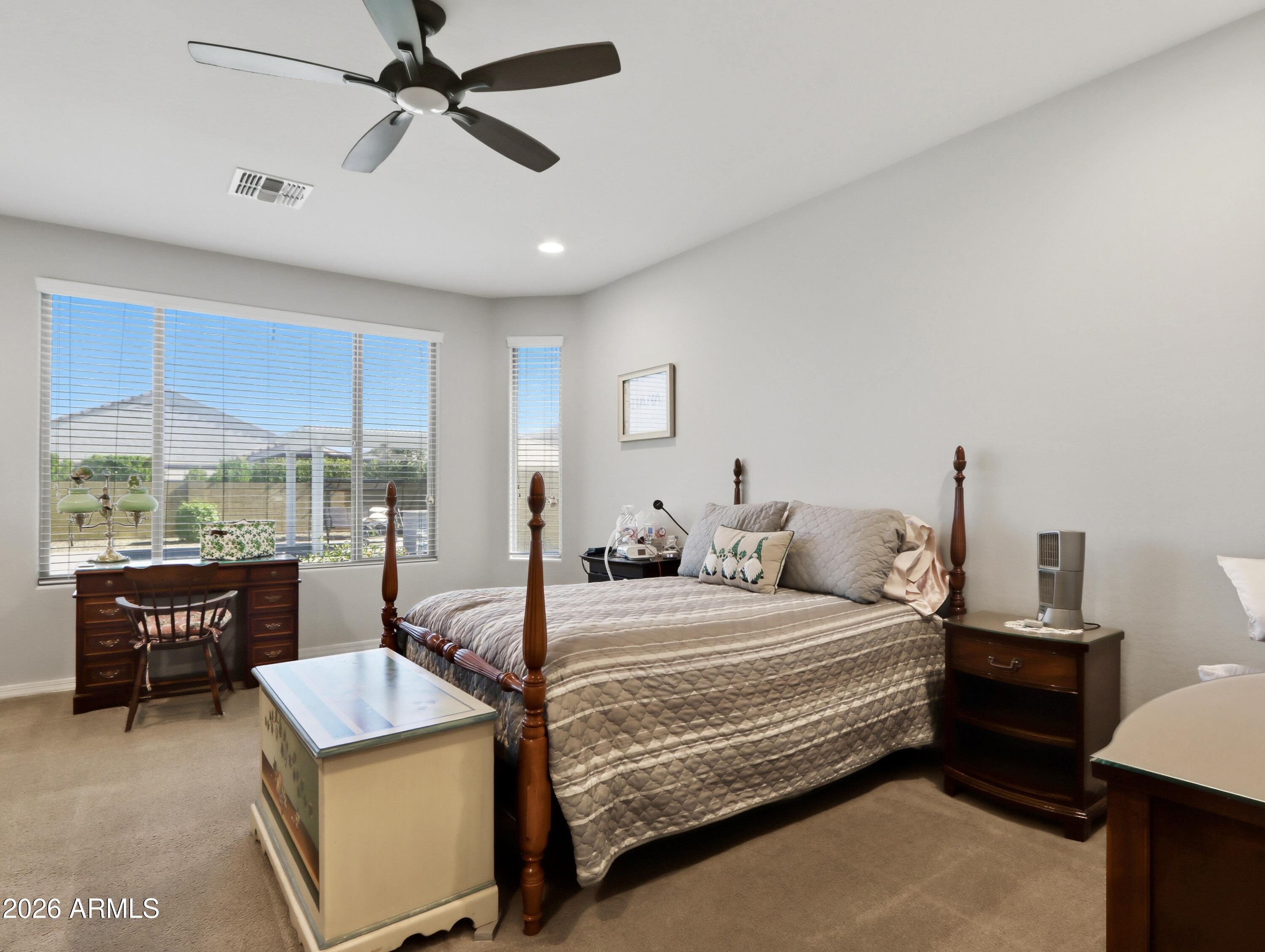 6421 Roy Rogers Road Phoenix, AZ 85083 - Photo 3 of 17 a bedroom with a bed window and couch
