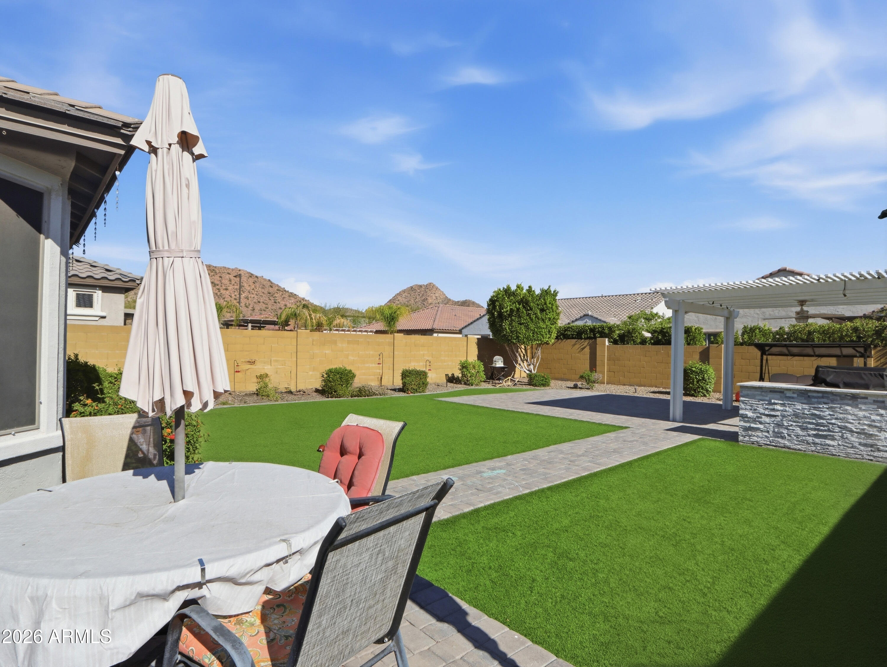 6421 Roy Rogers Road Phoenix, AZ 85083 - Photo 9 of 17 a view of yard with swimming pool and outdoor seating