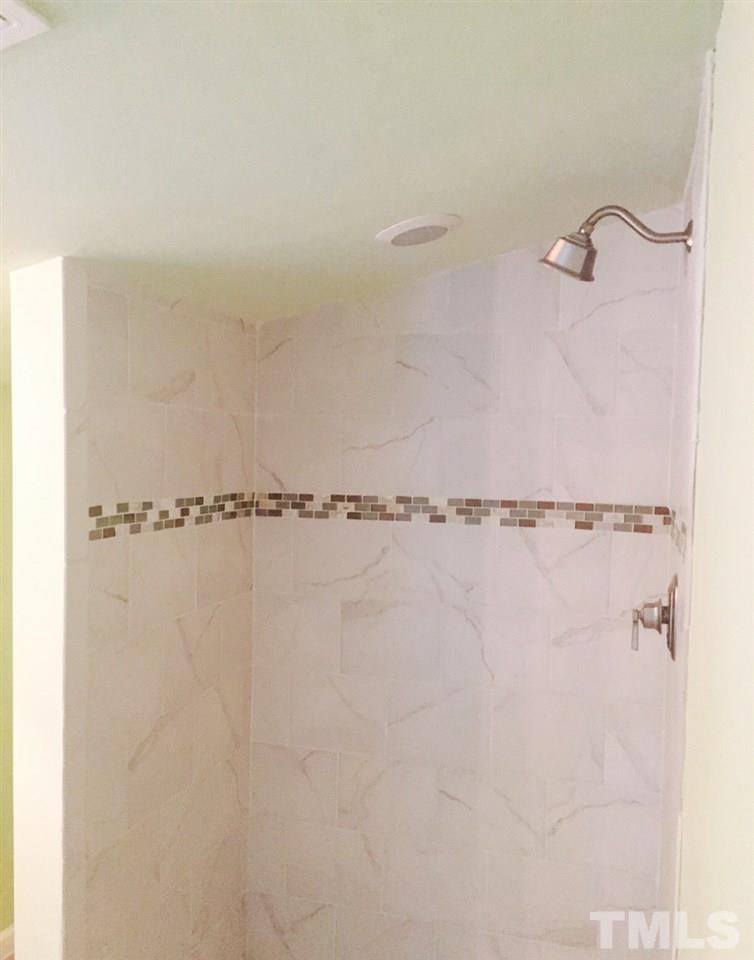 2706 Milburnie Road Raleigh, NC 27610 - Photo 5 of 8 a close view of a shower in bathroom