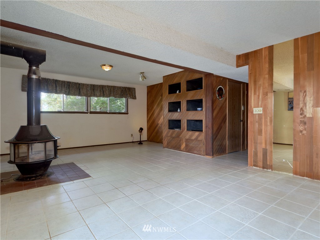 3619 Southeast 19th Court Renton, WA 98058 - Photo 13 of 21 a view of an empty room with a window