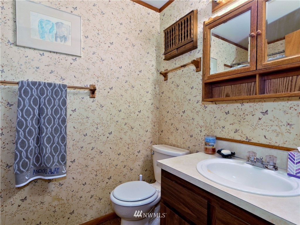 3619 Southeast 19th Court Renton, WA 98058 - Photo 9 of 21 a bathroom with a sink and a toilet