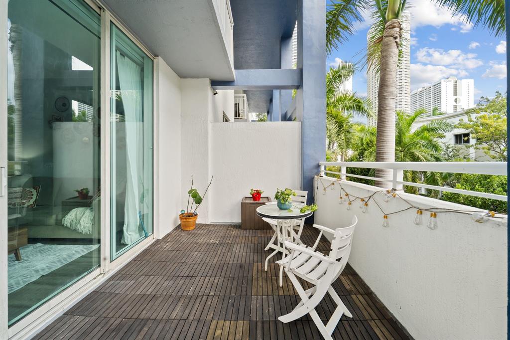 275 Northeast 18th Street, Unit 202 Miami, FL 33132 - Photo 12 of 20 a view of balcony with furniture