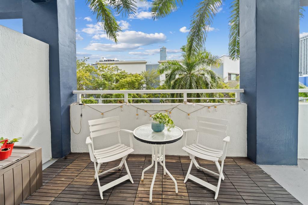 275 Northeast 18th Street, Unit 202 Miami, FL 33132 - Photo 10 of 20 a dining room with furniture and a floor to ceiling window
