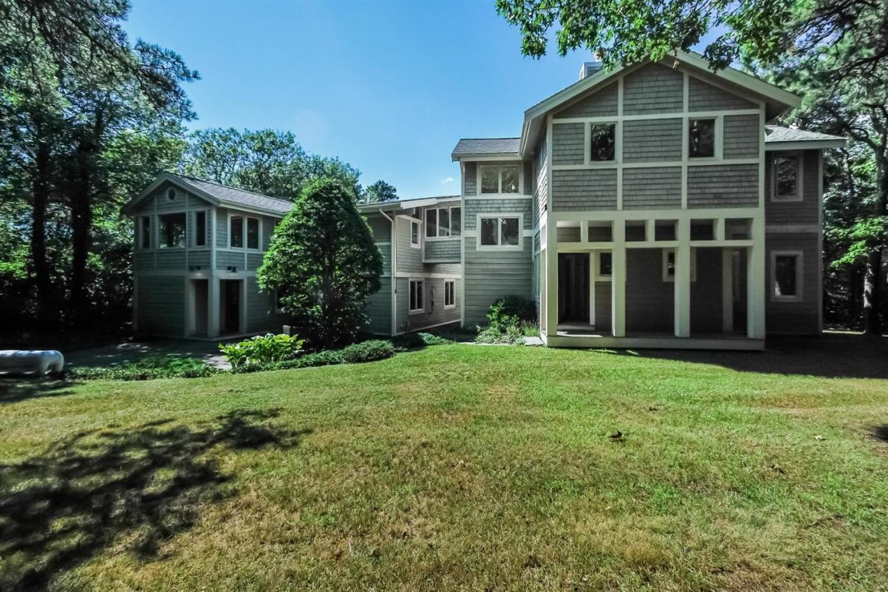 16 Rams Head Road Cataumet, MA 02534 - Photo 2 of 35 a view of an house with backyard space and garden