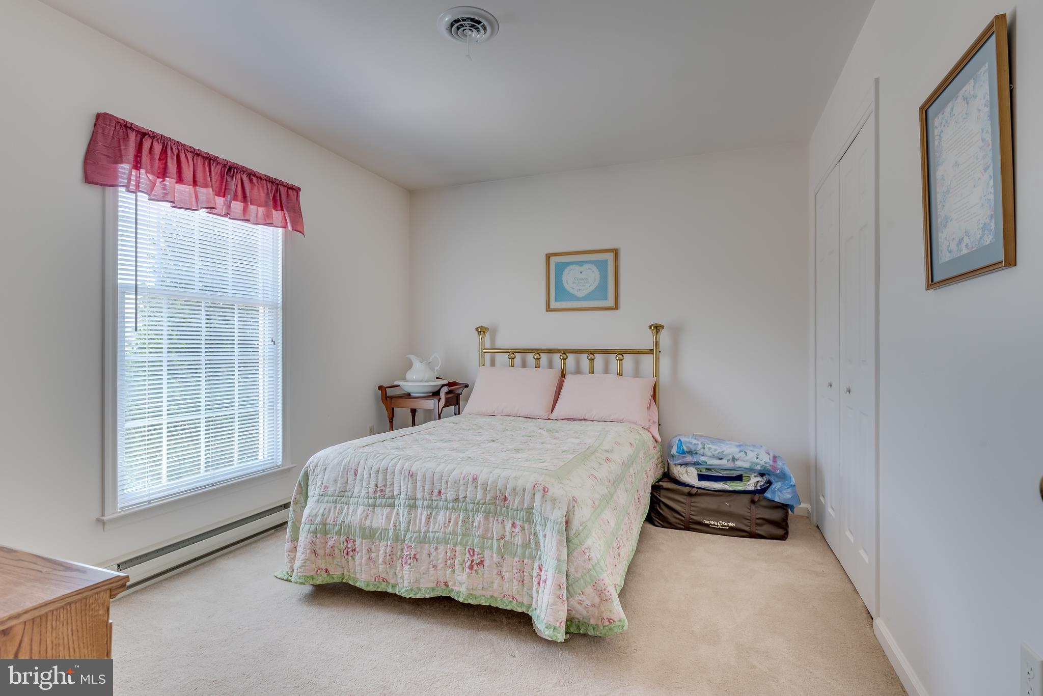1296 Spielman Road Berkeley Springs, WV 25411 - Photo 33 of 68 Bedroom 3 features neutral paint and carpet