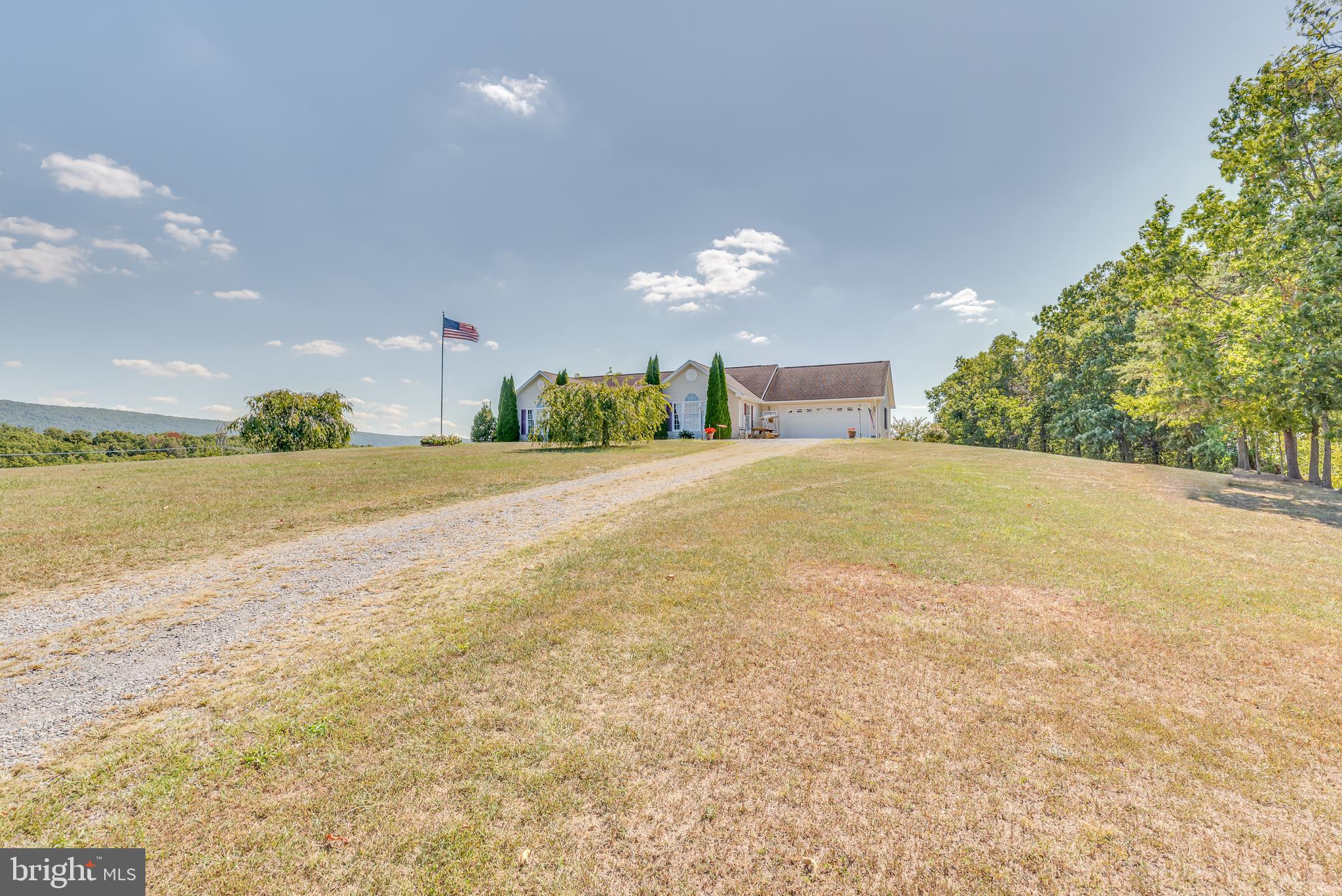 1296 Spielman Road Berkeley Springs, WV 25411 - Photo 45 of 68 The gravel driveway is nicely defined and level